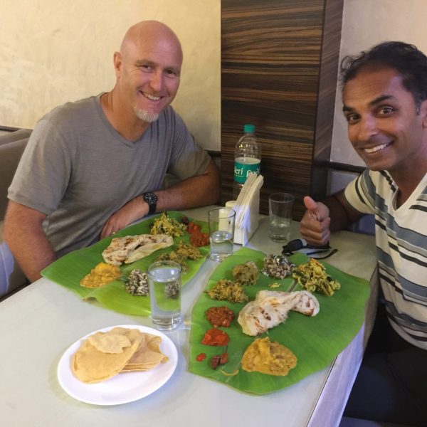 Jacob Rajan and Justin Lewis pose next to their meal
