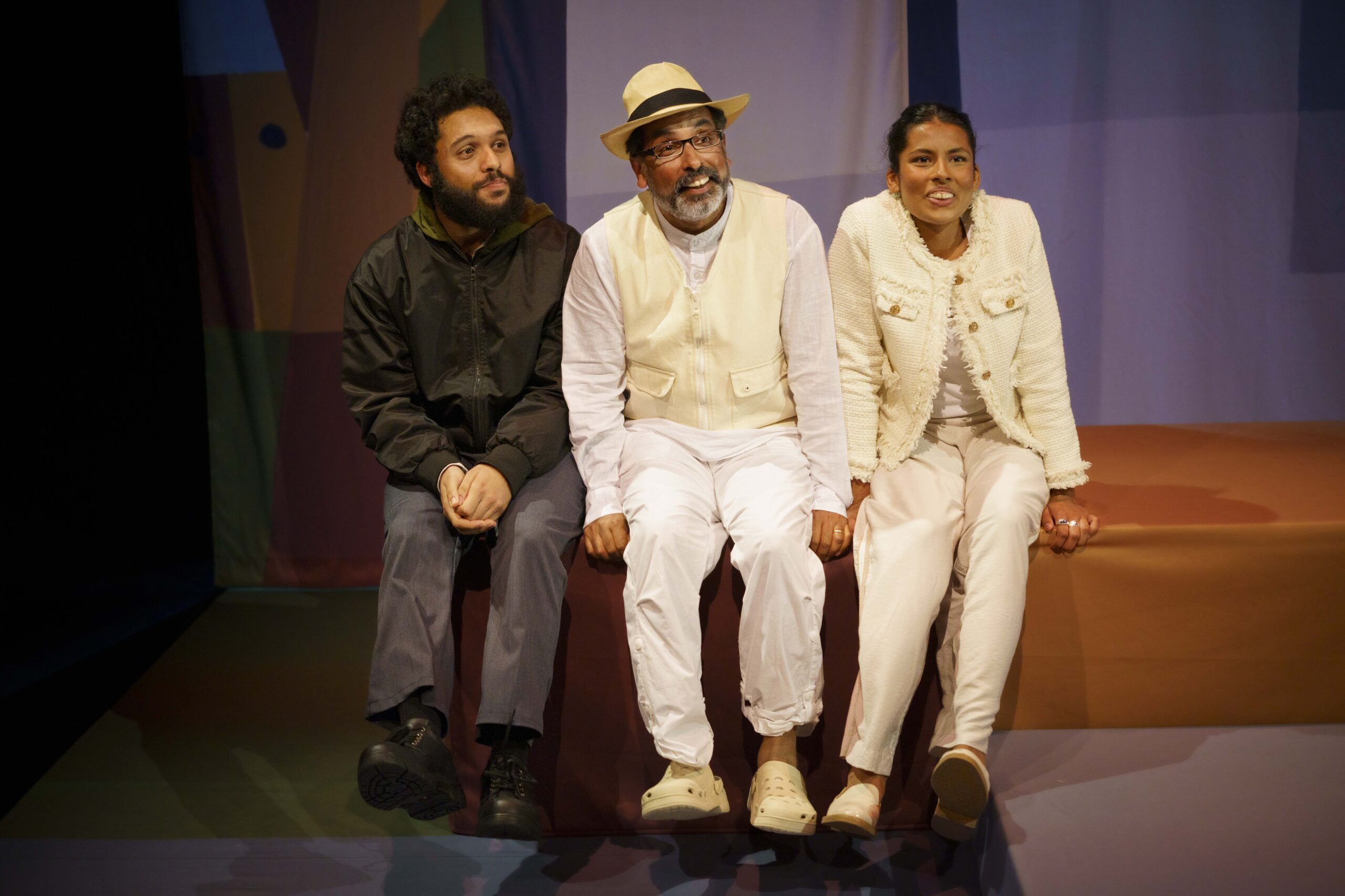 Image of the Ballon Dog actors sitting. Left to right - Jehangir, Jacob and Alisha